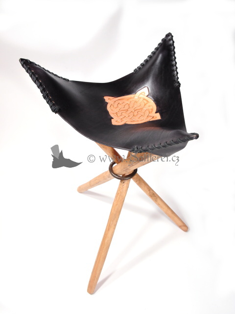 Tripod stool with leather seat. 