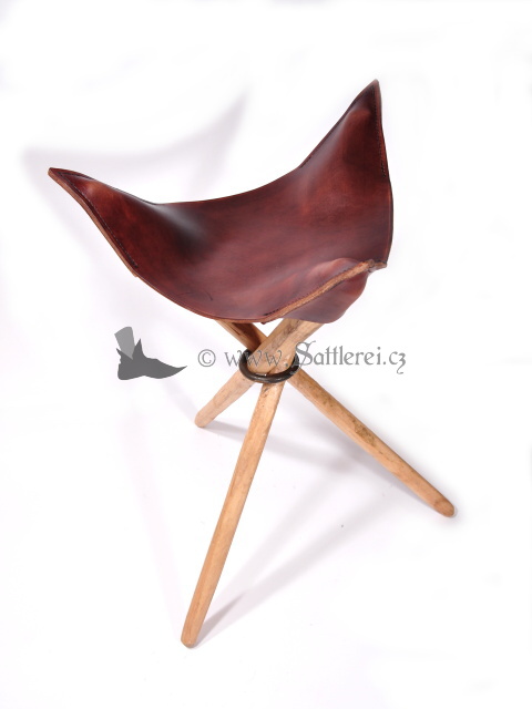 Tripod stool with leather seat. 